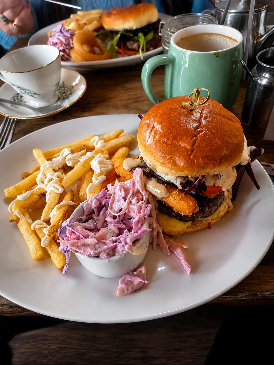 A beef burger with chips and slaw served at Fenland Hideaway